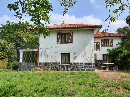 Casa de piedra enfoscada con finca en bartolo, valdoviño