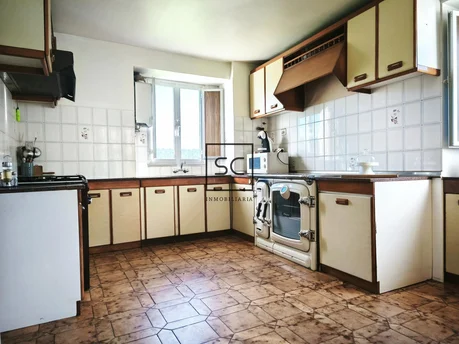 Casa de piedra con garaje y finca en cerdido